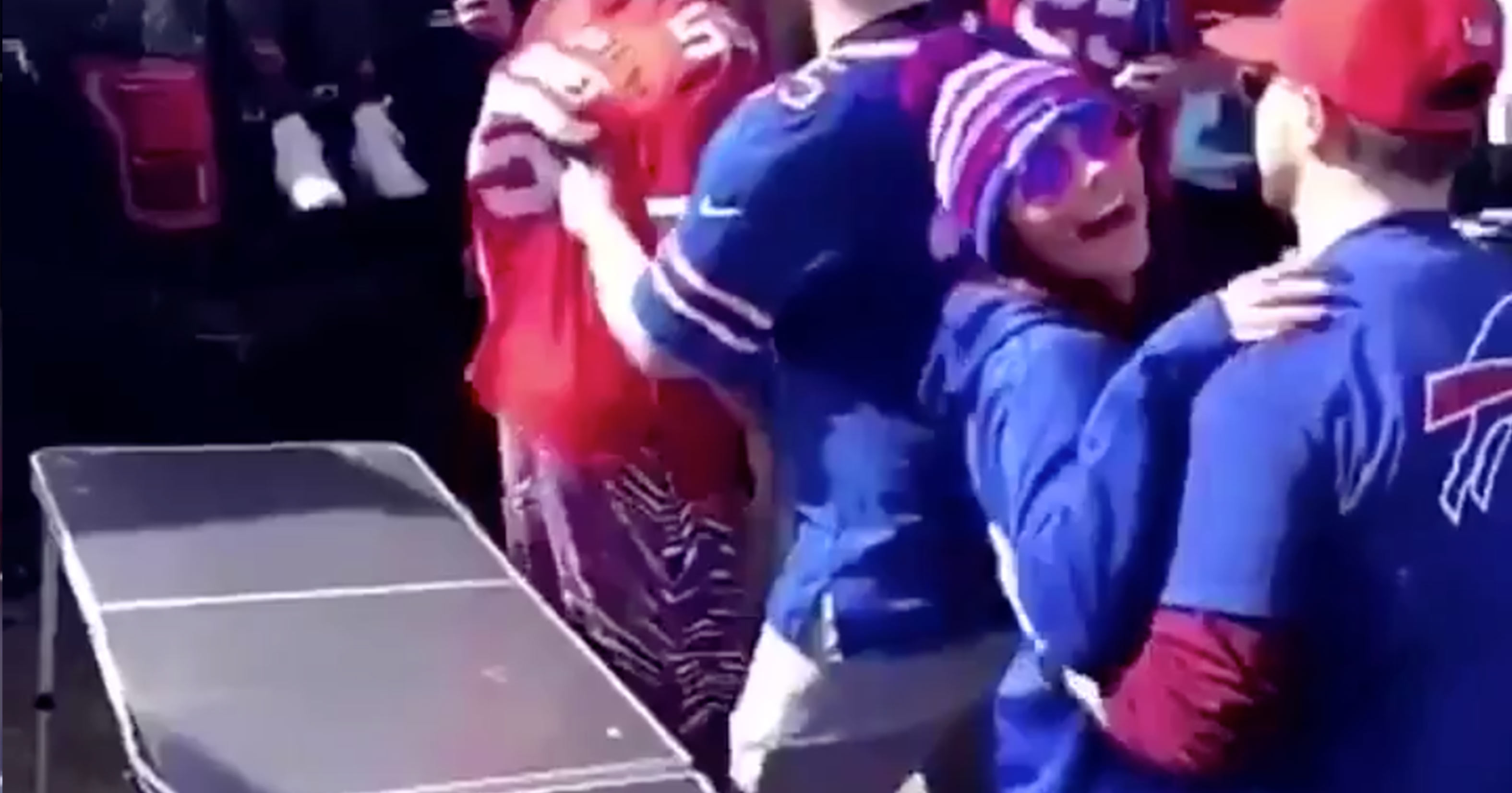 Bills Fan Tries Throwing Girlfriend On Table, Fails Miserably & Slams