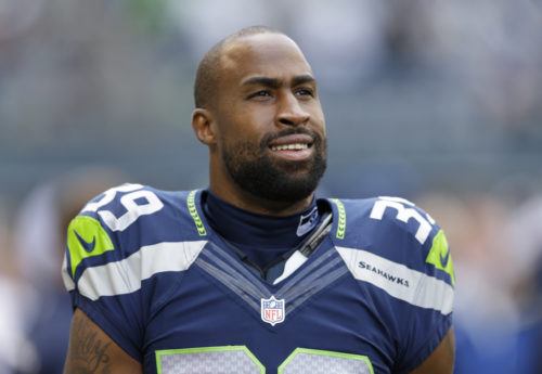 In this Sept. 22, 2013, photo, Seattle Seahawks' Brandon Browner stands before an NFL football game against the Jacksonville Jaguars in Seattle. Browner has been suspended indefinitely for violating the NFL's substance abuse policy. The suspension was announced Wednesday, Dec. 18, 2013, and is the second in two seasons for Browner. He was suspended four games last season for violating the league's policy on performance-enhancing substances. (AP Photo/Ted S. Warren) ORG XMIT: NY176