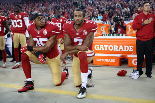 San Francisco 49ers Eric Reid (35) and Colin Kaepernick (7) take a knee during the National Anthem prior to their season opener against the Los Angeles Rams during an NFL football game Monday, Sept. 12, 2016, in Santa Clara, CA. The Niners won 28-0. (Daniel Gluskoter/AP Images for Panini) ORG XMIT: DGCA101