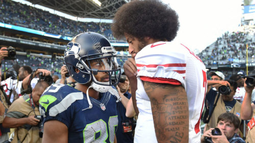 SEATTLE, WA - SEPTEMBER 25: Wide receiver Doug Baldwin #89 of the Seattle Seahawks speaks with quarterback Colin Kaepernick #7 of the San Francisco 49ers after the game at CenturyLink Field on September 25, 2016 in Seattle,Washington. The Seahawks won the game 37-18. (Photo by Steve Dykes/Getty Images)