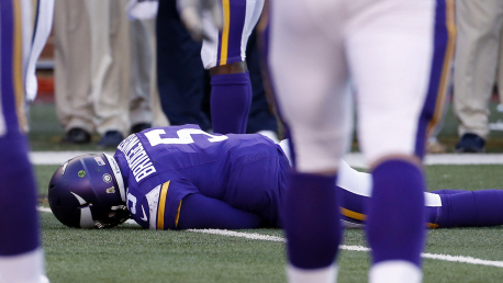 Minnesota Vikings quarterback Teddy Bridgewater lies on the field after a hit during the second half of an NFL football game against the St. Louis Rams, Sunday, Nov. 8, 2015, in Minneapolis. (AP Photo/Ann Heisenfelt)