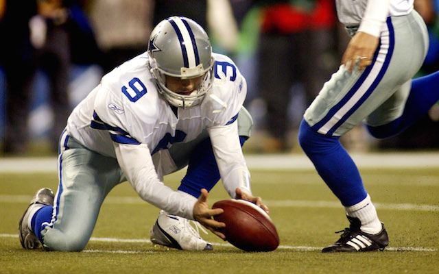 Dallas quarterback Tony Romo (9) mishandles the snap as kicker Martin Gramatica attempts a field against the Seattle Seahawks late in the NFC Wild Card game. The Seahawks defeated the Cowboys, 21-20, at Qwest Field in Seattle, Washington, Saturday, January 6, 2007. (Ron Jenkins/Fort Worth Star-Telegram/MCT)