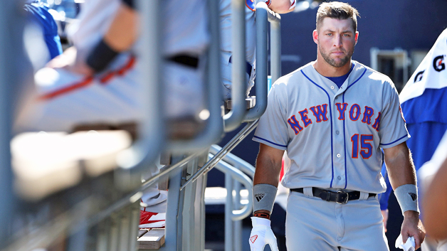 PEORIA, AZ - OCTOBER 13: Tim Tebow #15 (New York Mets) of the Scottsdale Scorpions watches from the dugout during the Arizona Fall League game against the Peoria Javelinas at Peoria Stadium on October 13, 2016 in Peoria, Arizona. (Photo by Christian Petersen/Getty Images)