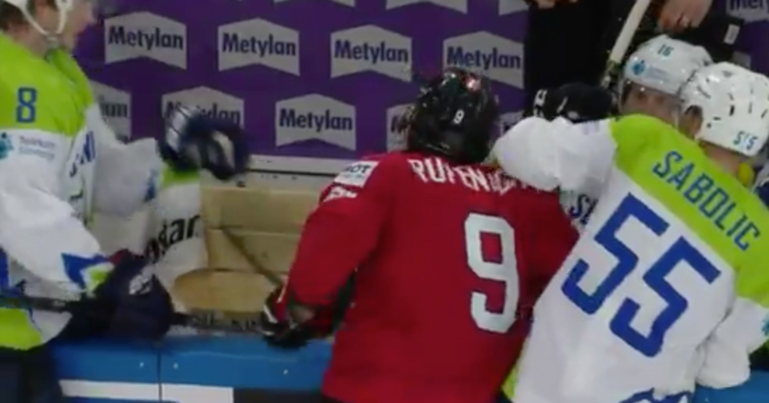 Hockey Player Tries To Cut Open Opponents Neck With His Skate