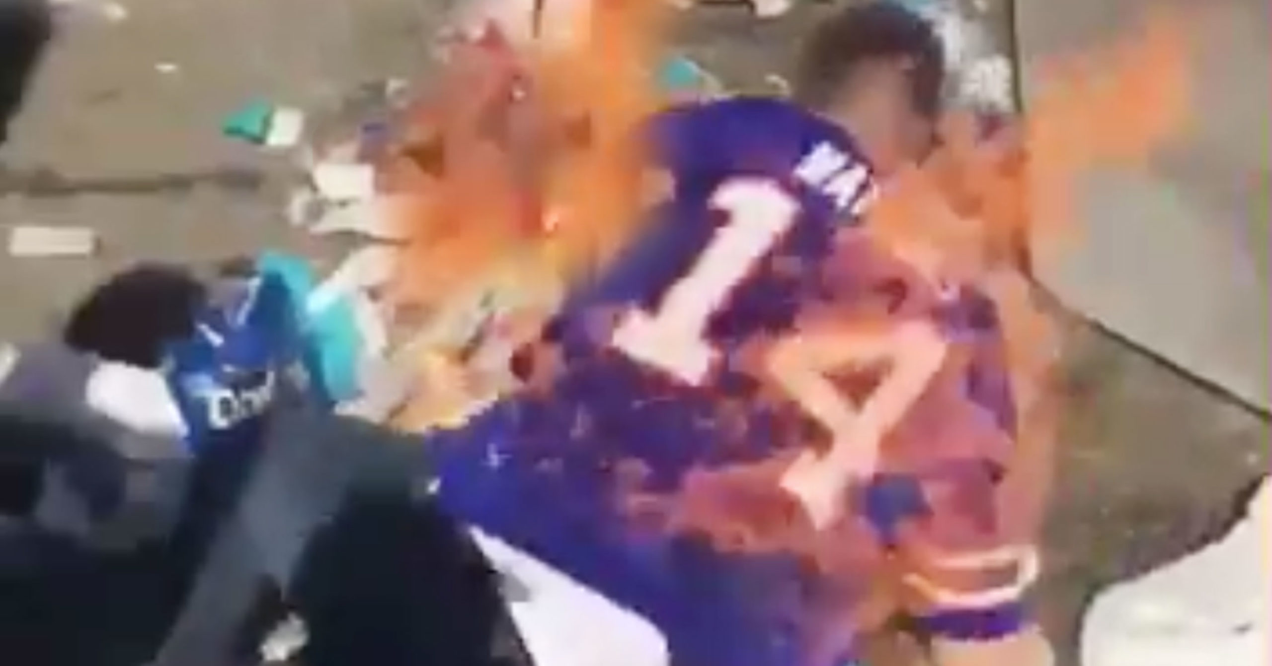 Buffalo Bills fan sets himself on fire and friends douse him in BEER in  video