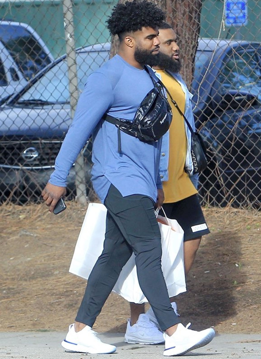 Ezekiel Elliott Wearing a Louis Vuitton Varsity Jacket & Bag With