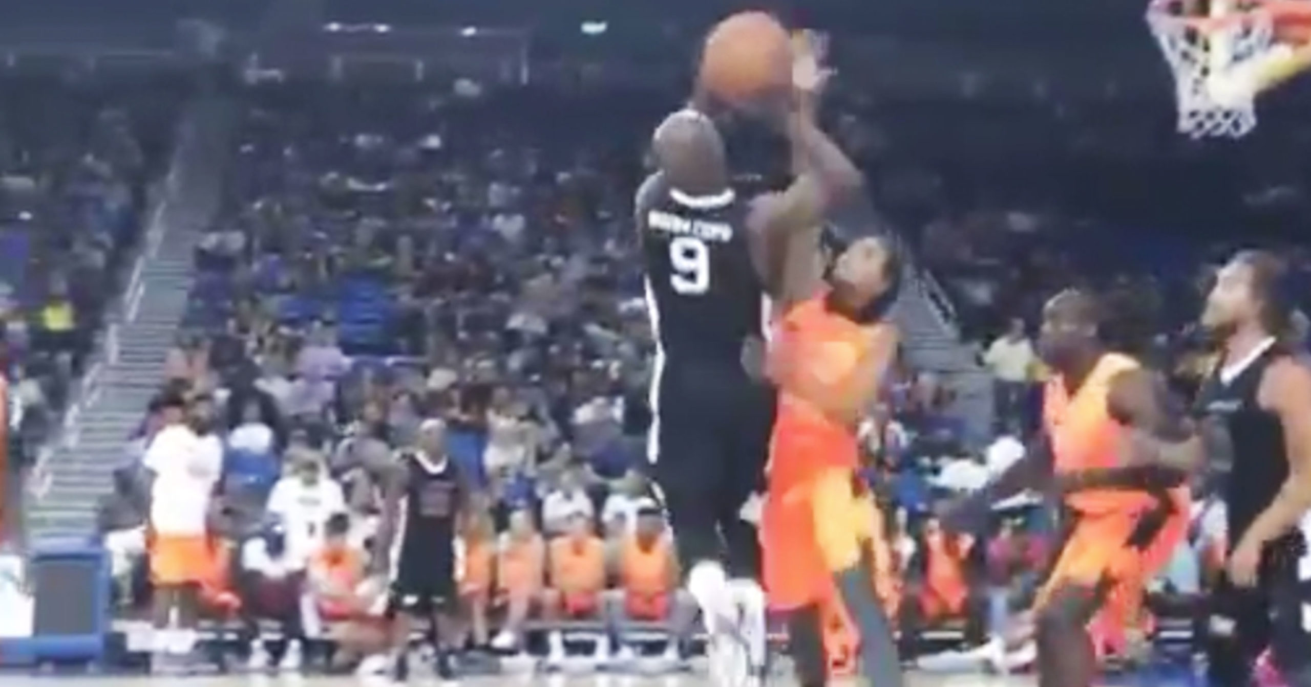 Watch Floyd Mayweather Get Blocked By A Model During A Charity Basketball Game (VIDEO)