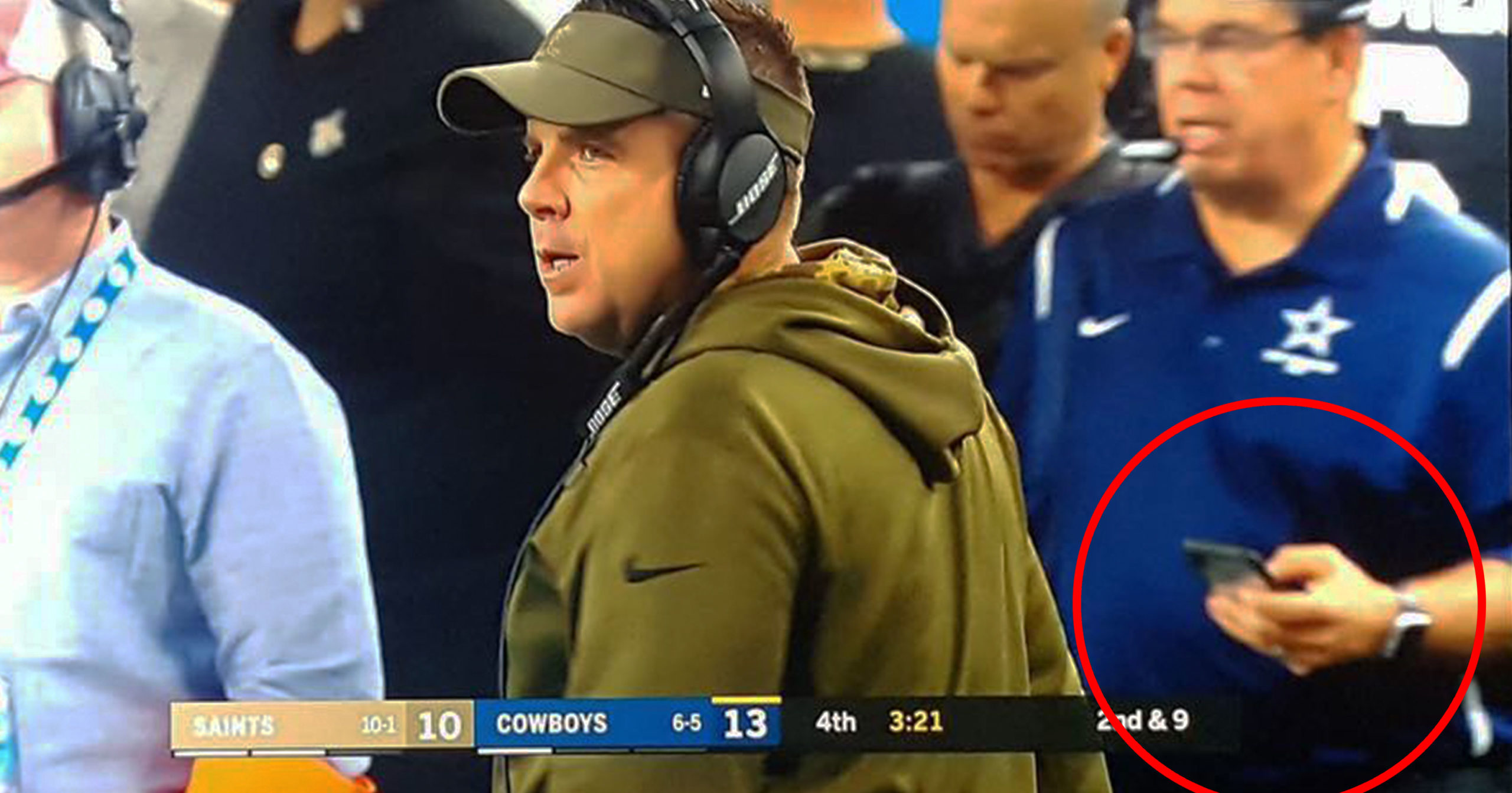 Cowboys Coach Caught Using Cellphone On Saints Sideline During Thursday Nights Game image
