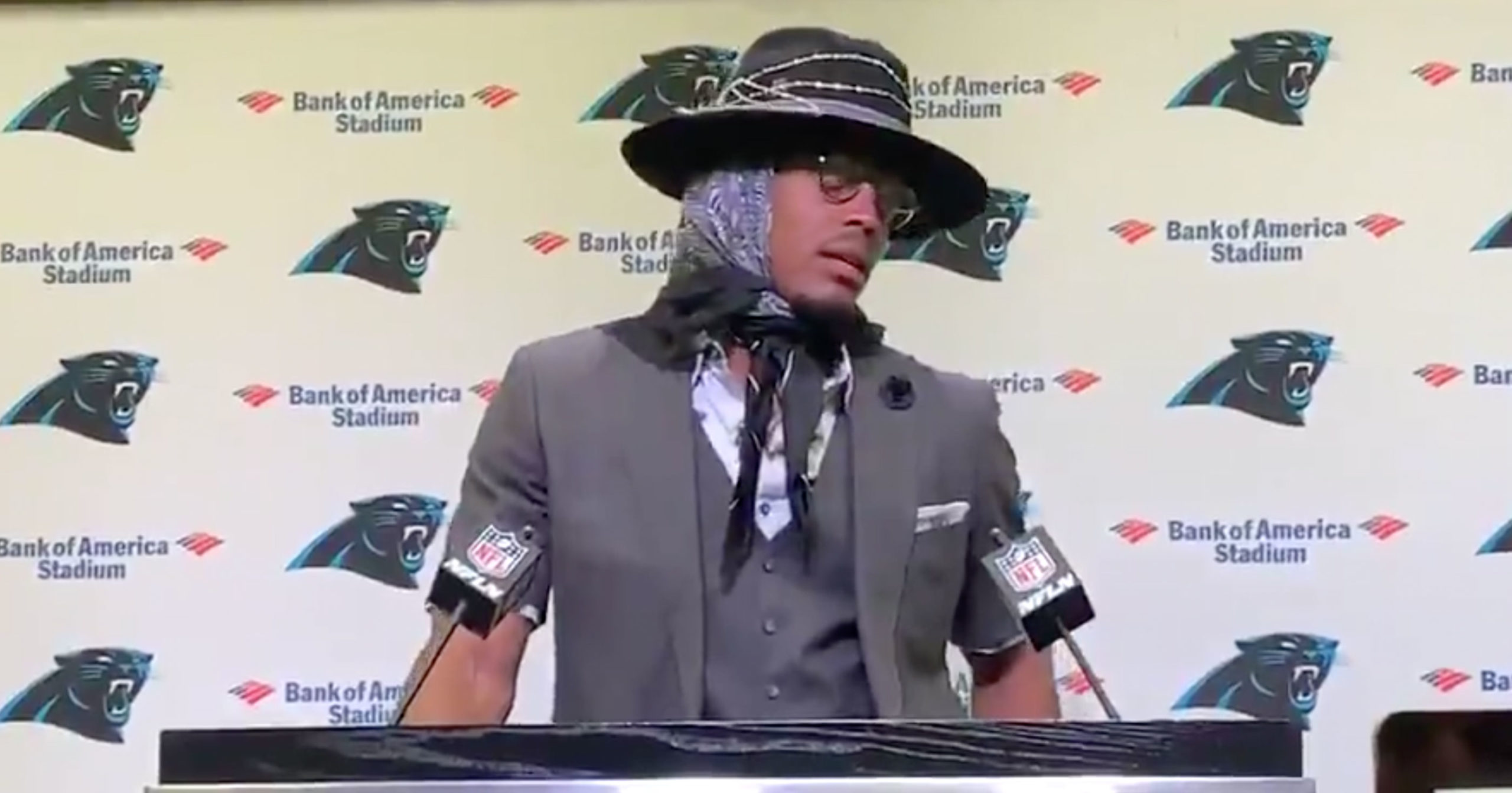 Cam Newton Goes Full Madea Postgame Wearing Bedazzled Hat Scarf And Short Sleeved Suit Video