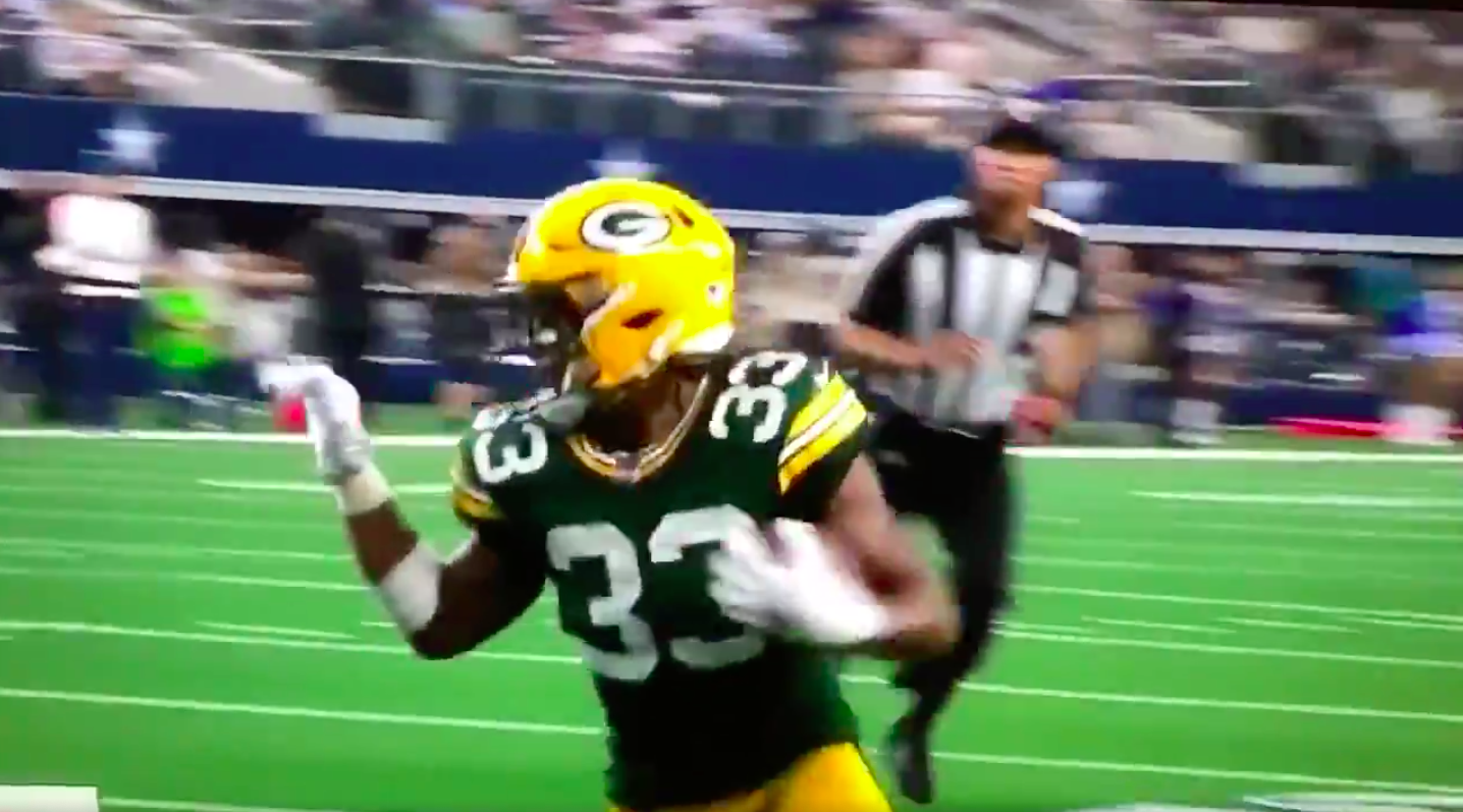 Green Bay Packers' Aaron Jones waves 'bye-bye' to Dallas defense