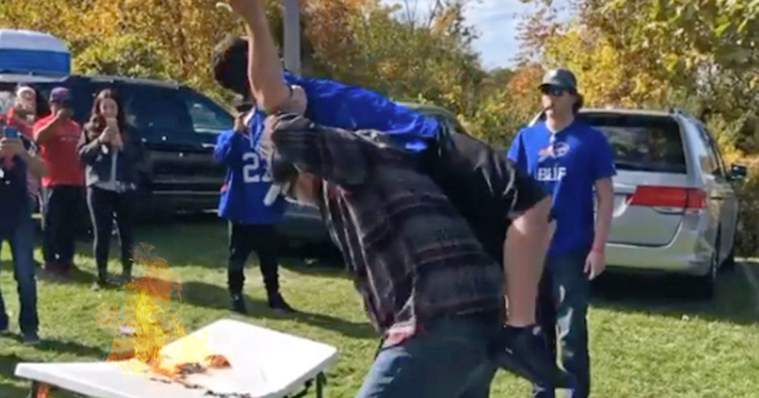 Bills Fan Catches On Fire After Being Thrown Wwe Style Into Burning Table Video