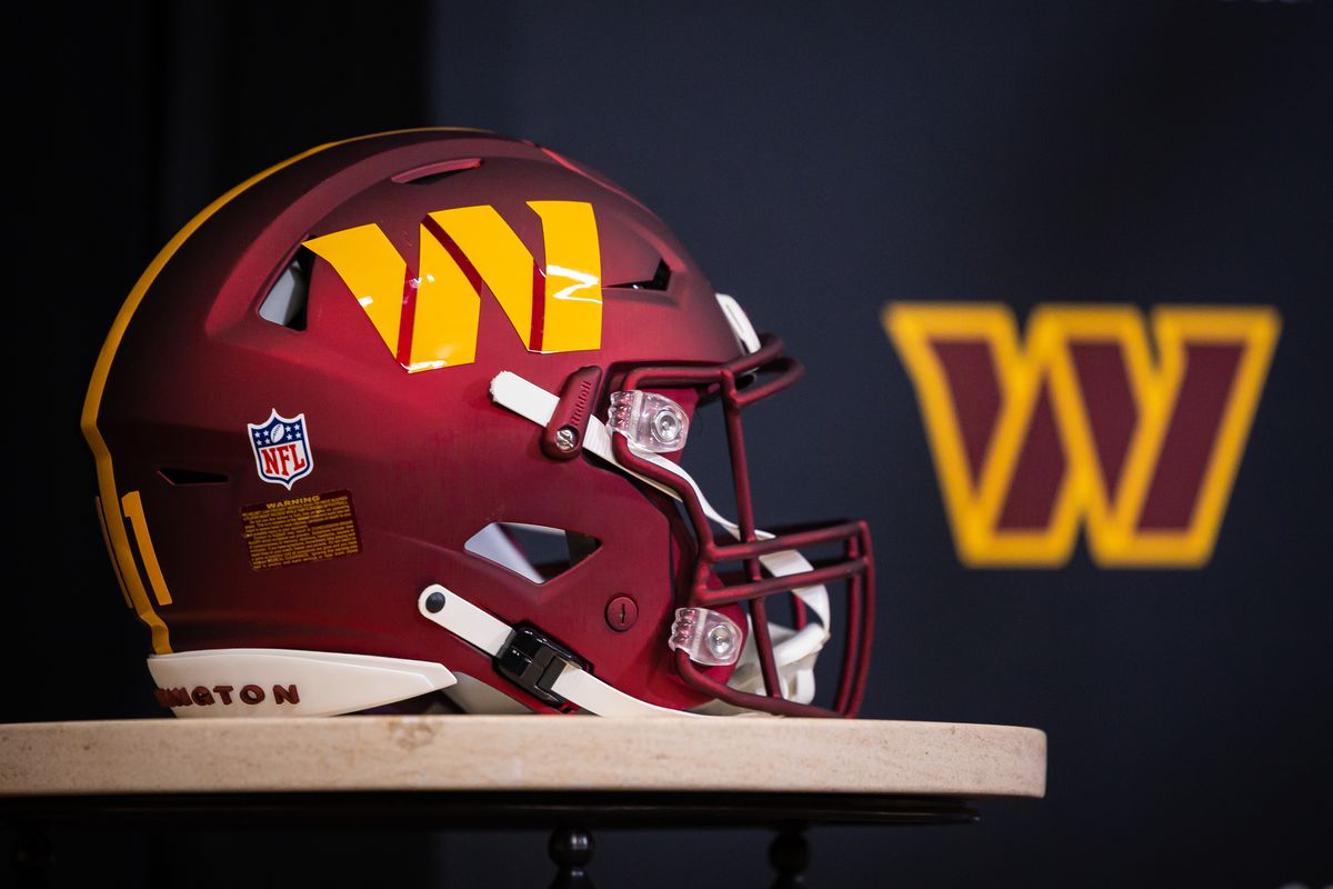 A Washington Commanders' football helmet on the sideline at Fedex Field in  North Englewood, Md., Sept. 25, 2022. As a continuation of the celebration  of the United States Air Force's 75th anniversary