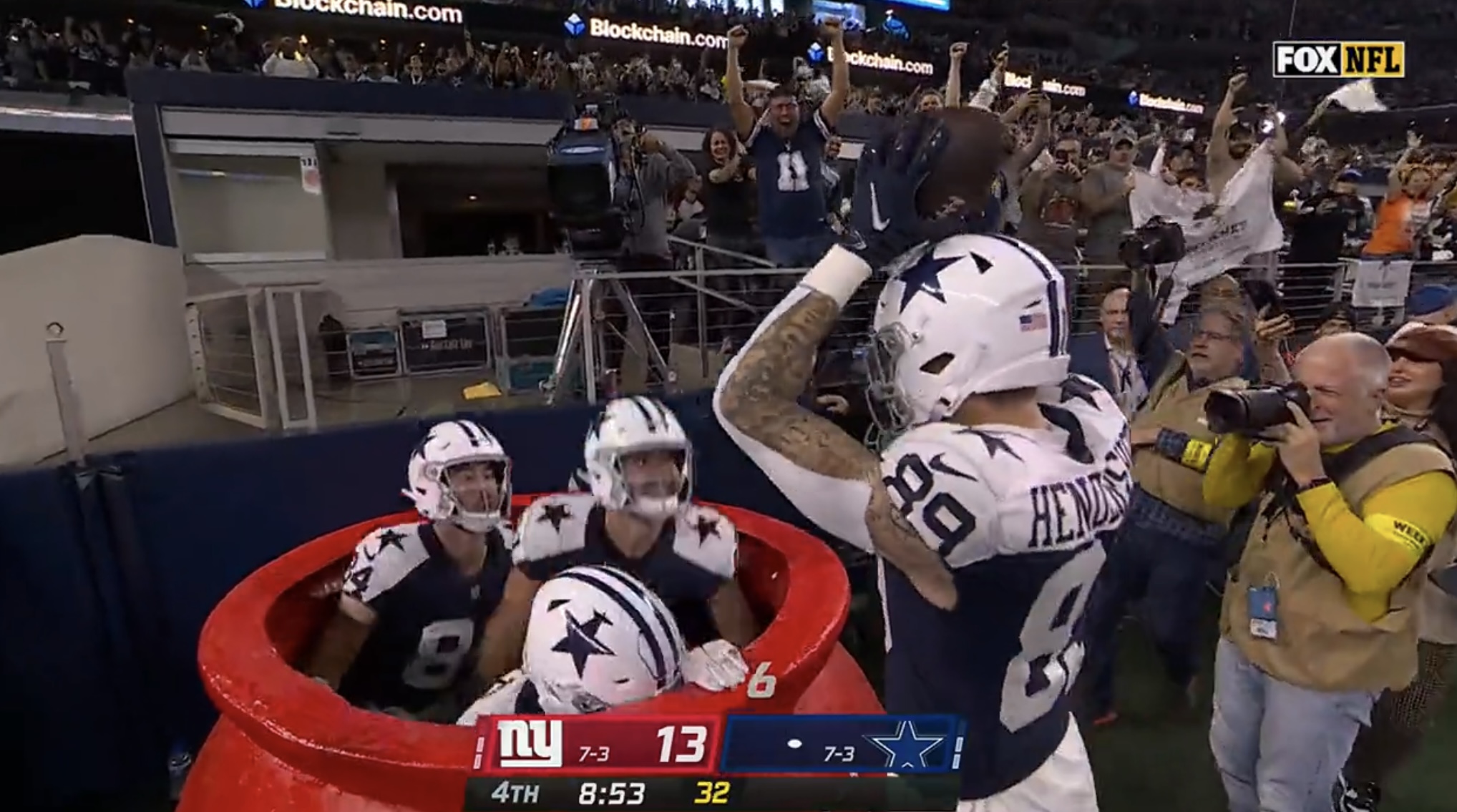 Watch: Cowboys TEs jump in Salvation Army kettle for 'Whac-A-Mole