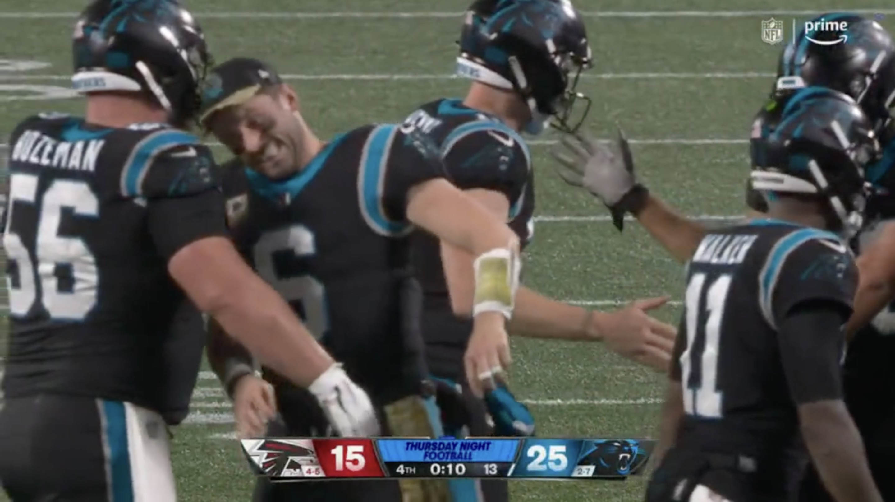 Baker Mayfield celebrates Panthers' 'Thursday Night Football' win by  headbutting teammates  without a helmet