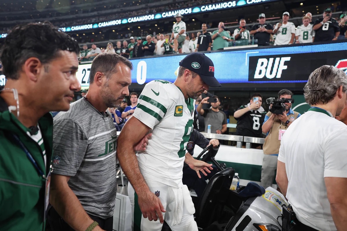 Aaron Rodgers injured on first Jets drive: ruled OUT, leaves in walking  boot