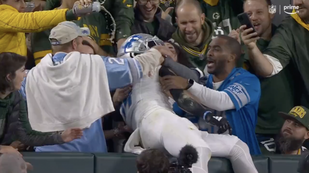 Packers Fan Spills Beer On Lions WR Amon-Ra St. Brown After He Did