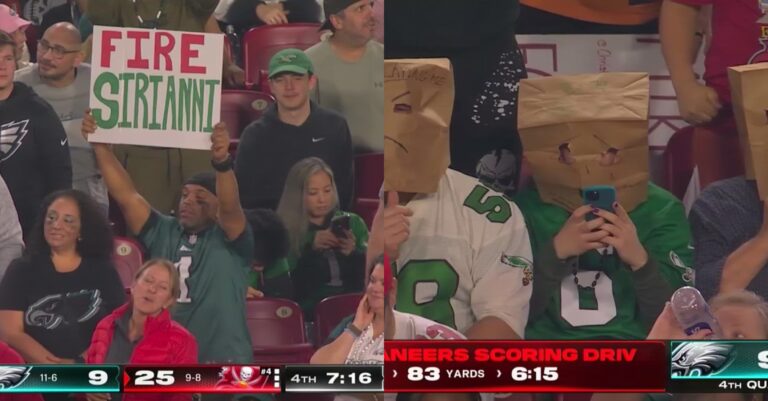 Eagles Fans Put Paper Bags Over Head, Hold Up 